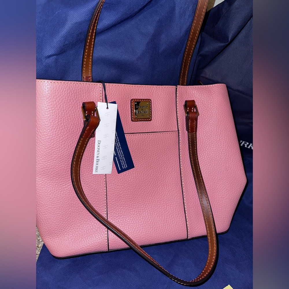This essential tote, pebble leather, clutch and FOB